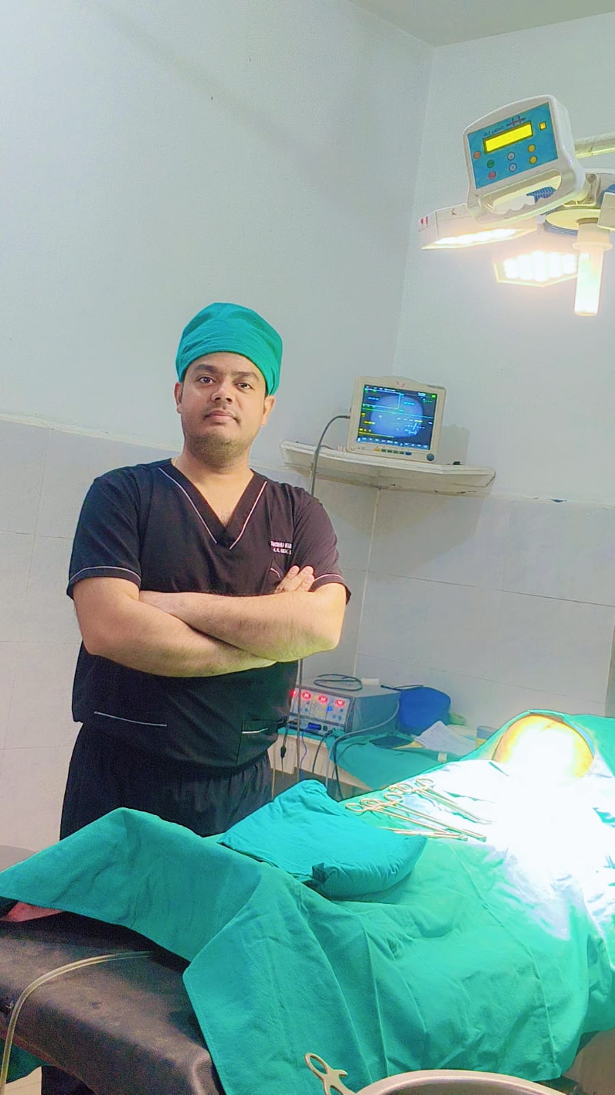 Dr. Anshu Kr. Tiwari with advanced OT monitoring equipment at O P Hospital