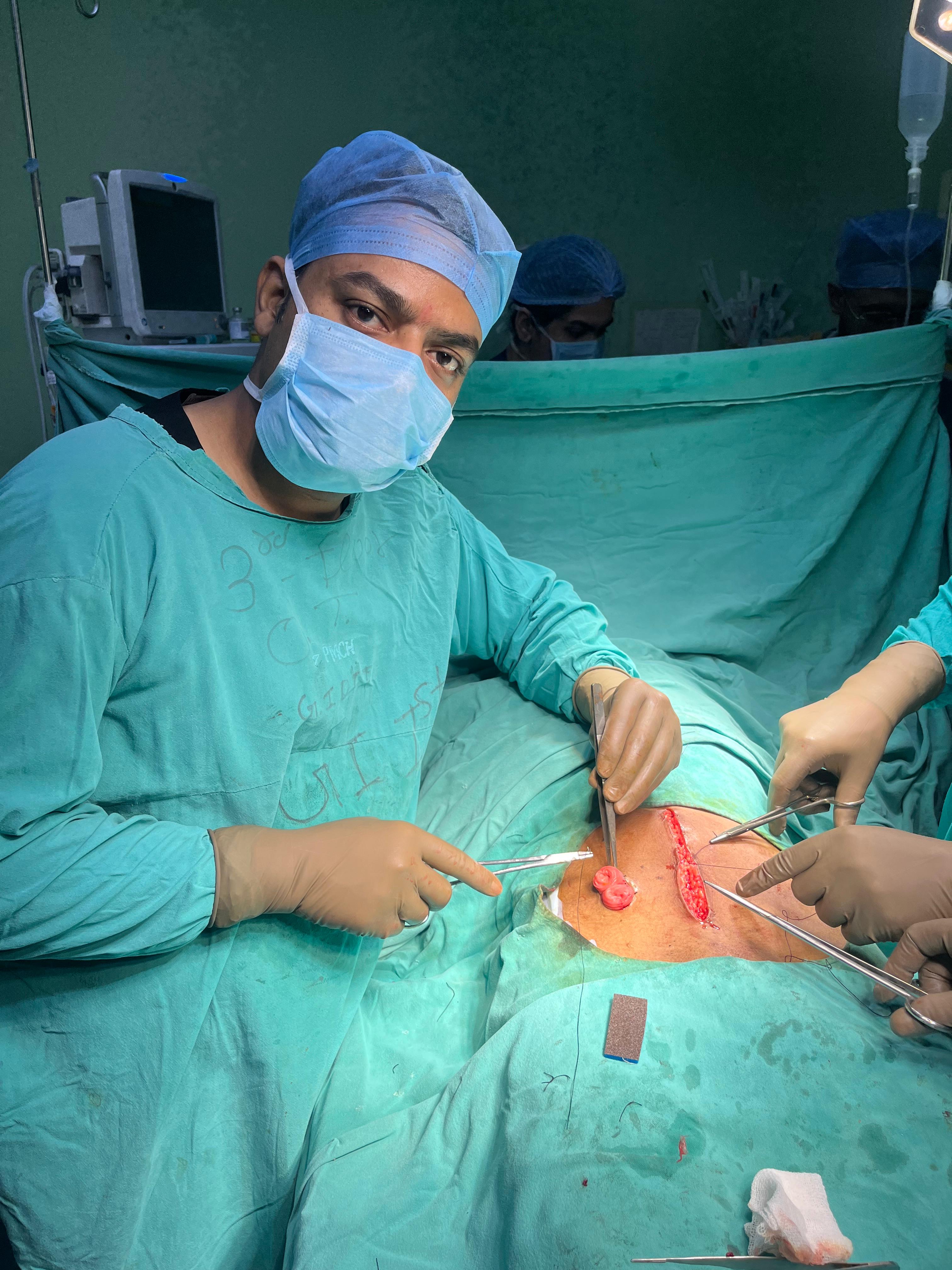 Surgical team performing operation at O P Hospital's High-Tech Modular OT